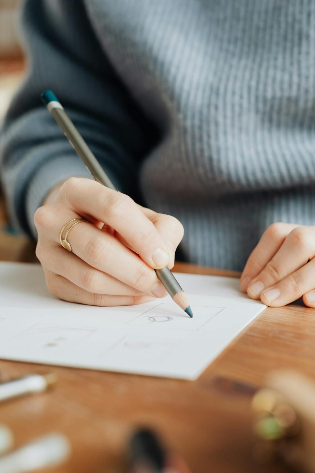 Woman mapping out an email marketing funnel for her business.